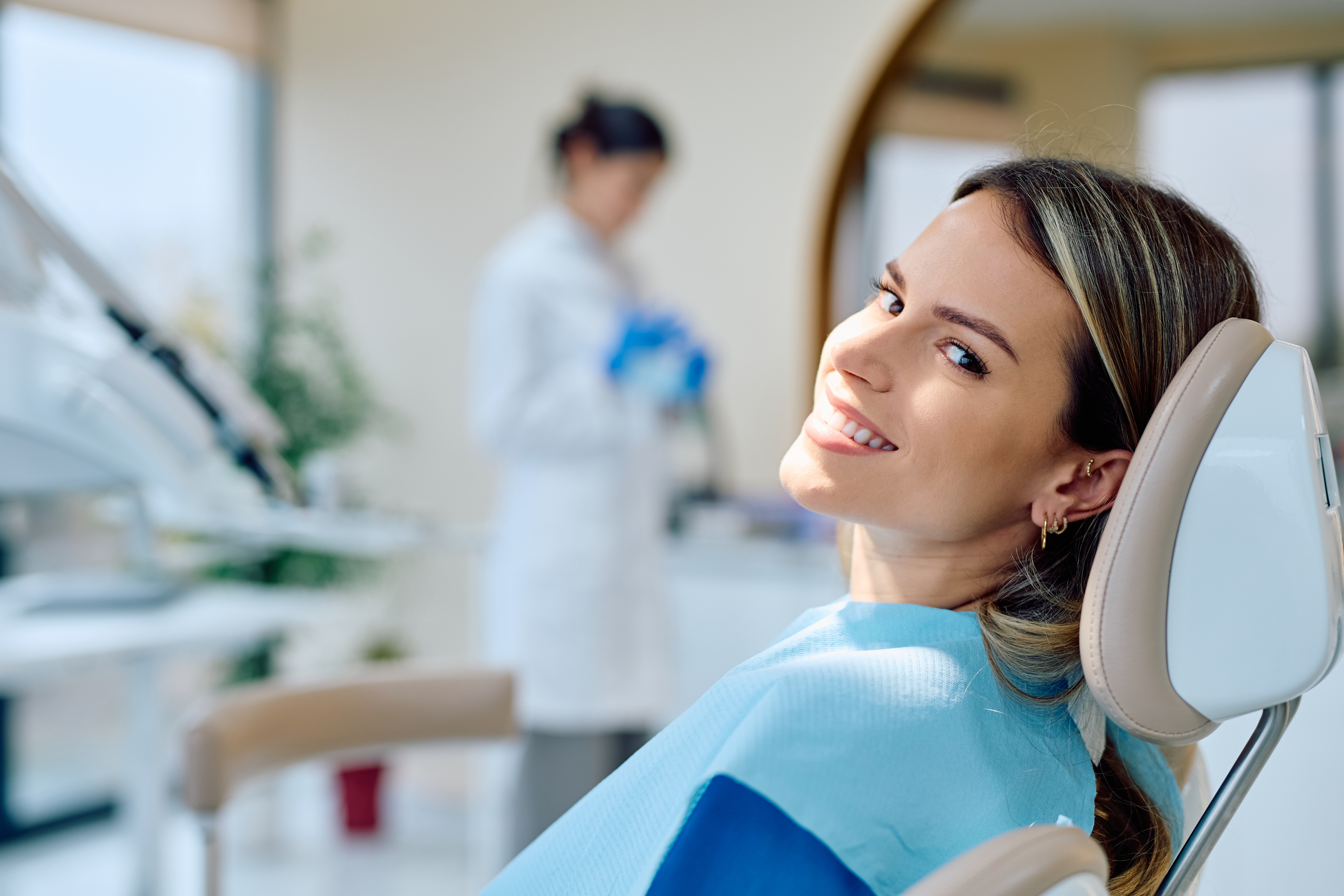 Patient smiling in dental chair